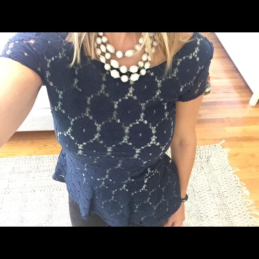 Navy lace peplum top w open back and mint underlay